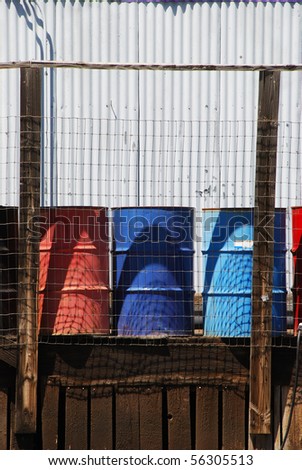Multicolored 55 gallon barrels on a old loading dock of a oil bulk plant in Klamath Falls