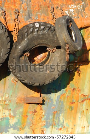 Tire bumpers on a old tug boat in the harbor near Downtown Coos Bay Oregon