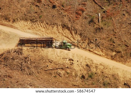 A loaded log truck  on a logging operation or \