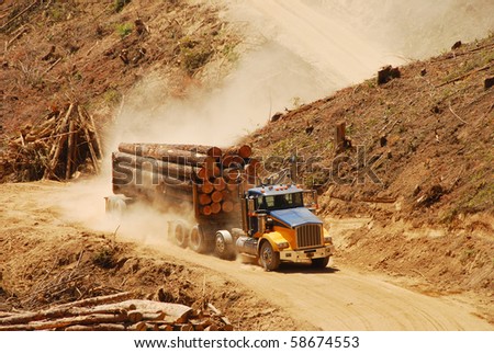 A loaded log truck  on a logging operation or 