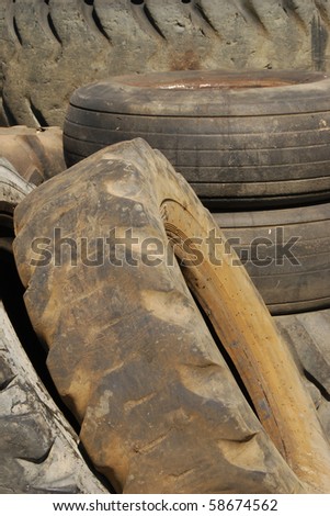 Old tractor tires in the refuse area of a industrial tire shop in Roseburg Oregon