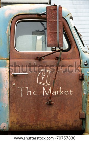 Sign on a truck outside a farmers market in McMinnville Oregon