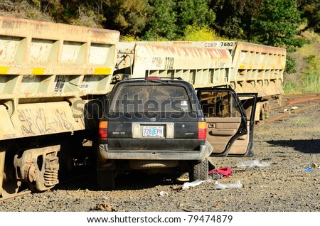 WINSTON, OR - JUNE 14: A sport utility vehicle with five occupants hit parked railroad cars near Winston Oregon.  All occupants received non life threatening injuries. June 14, 2011 in Winston, OR