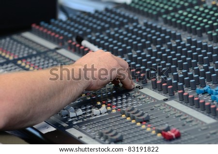 Sound mixing board during a musical performance at a fair