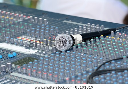 Sound mixing board during a musical performance at a fair