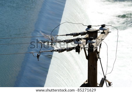 Power pole and lines at an dam on the North Umpqua River near Roseburg Oregon