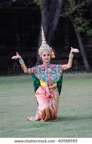stock photo : PHIMAI, THAILAND - NOVEMBER 14: A Thai dancer performs Thai dance in the occasion of Phimai Light and Sound Festival at Phimai Stone Castle November 14, 2009 in Phimai, Thailand.