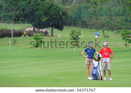 Brittany Lang (L) competes at Honda-PTT LPGA Thailand at Siam Country Club on February 20, 2010 in Pattaya, Thailand