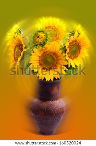 Bouquet of sunflowers in a clay vase.