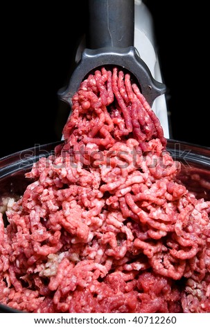 Meat through a meat grinder