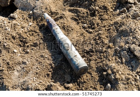 Small-caliber round from antiaircraft installation. Lain in the earth more than 65 years.Not broken off shell and mines, Second World War times, inhabitants of Ukraine and Russia very often find.