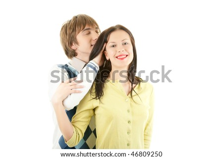 Man with closed eyes pushing his hands through his girlfriend hair