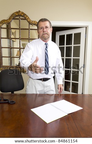 Loan officer at local bank is going to interview business man to better understand his needs