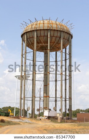 City water supply tank under construction, deep wells have to be dug to have enough water to keep the tank full