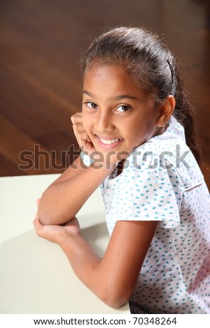 Portrait of happy school girl with beautiful smile