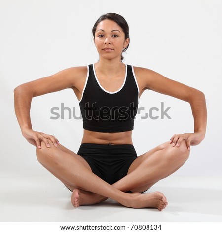 Girl sitting crossed legged