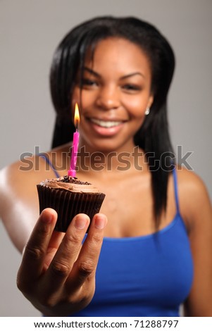 birthday cake pink and black. Beautiful young lack girl,