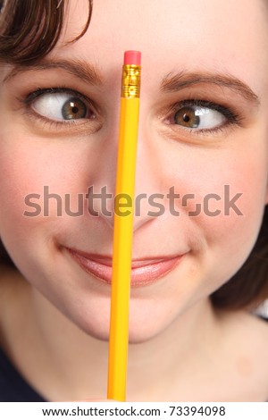 stock photo Young caucasian woman having fun going cross eyed with a