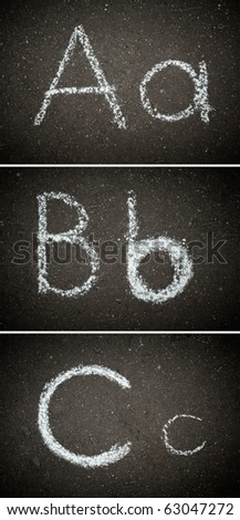 The initial letters of the alphabet on the asphalt