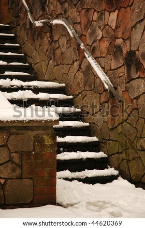 stairs covered by snow, vertically framed shot