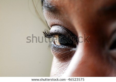 face and eye of african girl, vertically framed shot
