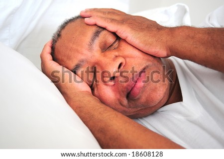African american man sleeping in bed.