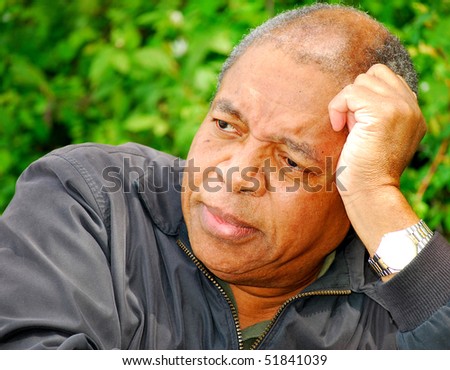 African american man thinking about a new job position.