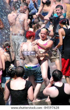 SEATTLE, WA - JUNE 25. People dancing at the Seattle Center  June 25, 2006.  The Center is hosting the Gay/Lesbian Pride Celebration