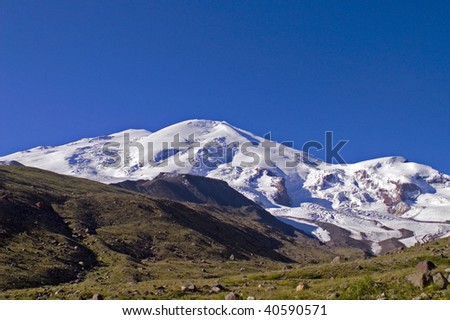 Elbrus in beams of the morning sun. Elbrus is the highest top of Europe.