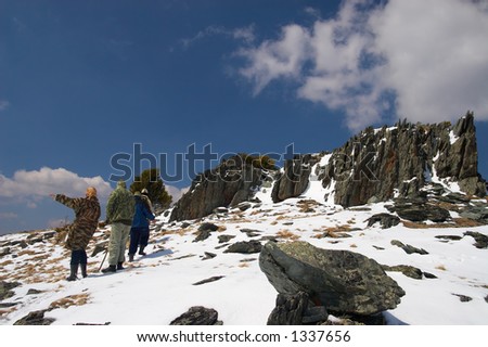 Climbers, mountains and blue sky. Altay, Russia.
