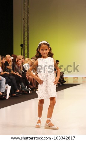 MOSCOW-SEPTEMBER 5:Unidentified model shows bio-dynamic children\'s shoes from sustainable materials Spanish brand at the international Lea Lelo Fashion Fair on September 5, 2011 in Moscow