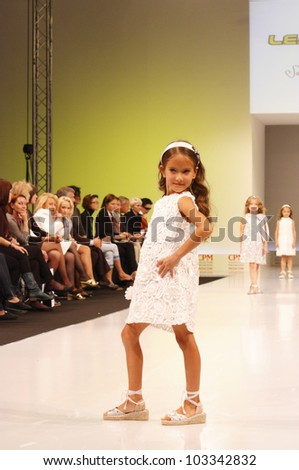 MOSCOW-SEPTEMBER 5:Unidentified models show bio-dynamic children\'s shoes from sustainable materials Spanish brand at the international Lea Lelo Fashion Fair on September 5, 2011 in Moscow