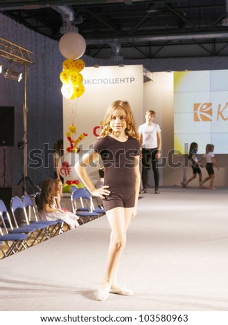 MOSCOW - SEPTEMBER 29: Unidentified models show a children\'s sports clothing Russian brand Korri Premiere Moscow children at the International Fashion on September 29, 2011 in Moscow