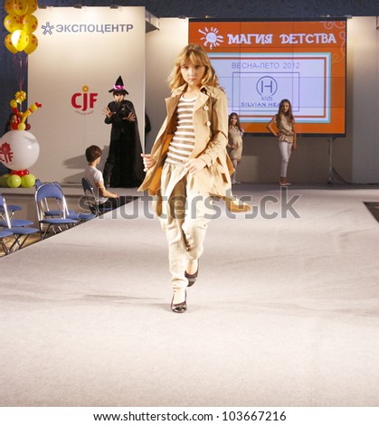 MOSCOW - SEPTEMBER 29:Unidentified models show children\'s clothing brand of Italian SILVIAN HEACH Collection Premiere Moscow children at the International Fashion on September 29, 2011 in Moscow