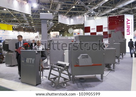 MOSCOW- OCTOBER 12:Machines for grinding fresh meat and meat products, the Russian company UNITY at the international exhibition AGROPRODMASH `2011 on October 12,2011 in Moscow