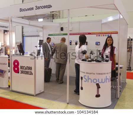MOSCOW-SEPTEMBER 6: The stand of the 8th Commandment distributor systems to prevent the theft of goods at the international exhibition SHOP DESIGN RETAIL TEC RUSSIA 2011 on September 6,2011 in Moscow
