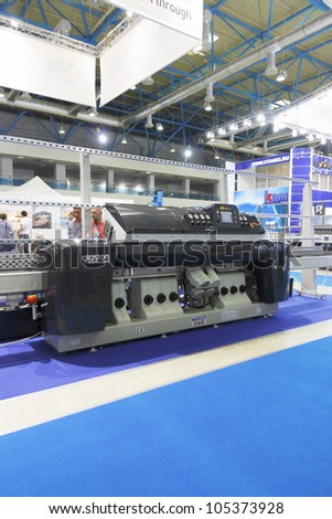 MOSCOW-JUNE 15:Exposure of the Finnish company Glaston generating equipment for cutting, processing and grinding of glass at the international exhibition MIR STEKLA\' 2012 on June 15, 2012 in Moscow