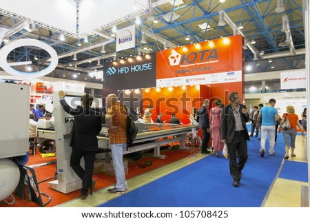 MOSCOW-JUNE 15:The stand Russian company YTA to supply equipment for cutting and processing glass from Europe and China at the International Exhibition MIR STEKLA'2012 on June 15, 2012 in Moscow