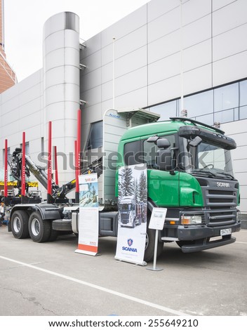 MOSCOW- OCTOBER 24: Pointing device Hiab Loglift F96ST for timber loading on a truck Scania at the International exhibition LESDREVMASH on October 24,2012 in Moscow