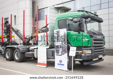 MOSCOW- OCTOBER 24: Pointing device Hiab Loglift F96ST for timber loading on a truck Scania at the International exhibition LESDREVMASH on October 24,2012 in Moscow