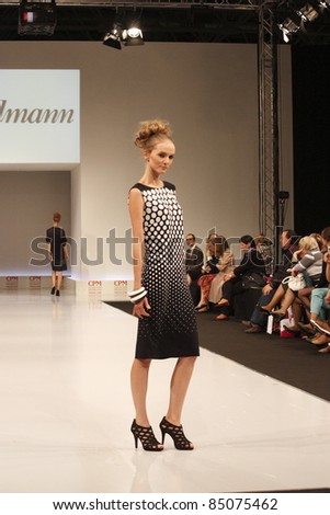 MOSCOW-SEPTEMBER 5: A model walks the runway at the International Fashion Fair featuring fashions by the German company Steilmann showcasing the 