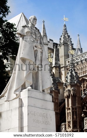 London. King George V statue. Westminster is on the back.