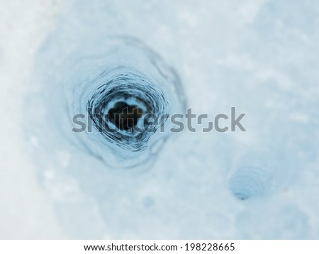 Crystal Blue Vertical Ice Tunnel that with \