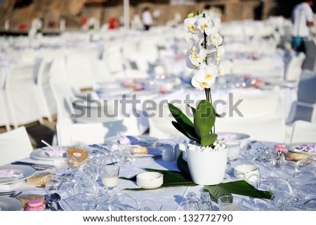 Table set up for a wedding ceremony on beach resort
