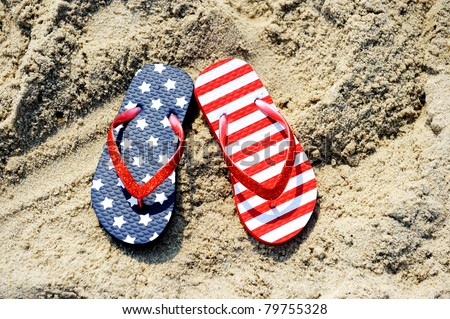 Pair Of Flip-Flop On Sand Of Jersey Shore With Usa Flag Pattern On It