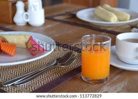 Breakfast in Thailand with tropical fruits and orange juice