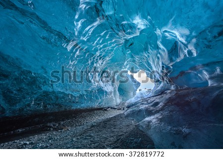 Inside an ice cave in Vatnajokull, Iceland. The ice is thousands of years old and so packed it is harder than steel and crystal clear.