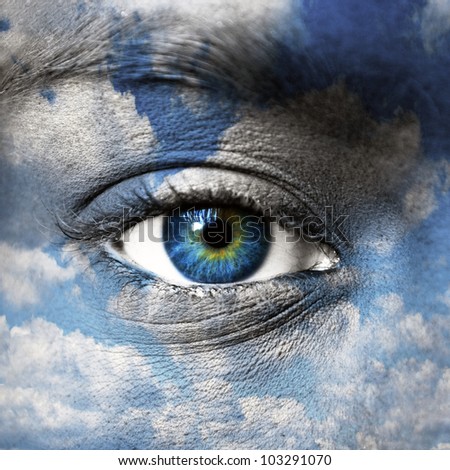 Blue eye with blue sky pattern - Spiritual concept