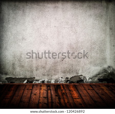 Empty old room with grunge wall and wooden floor