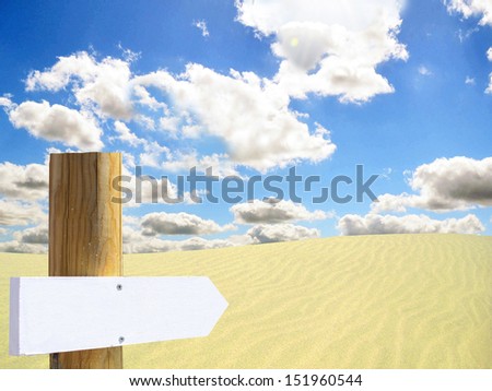 Empty wooden sign in desert